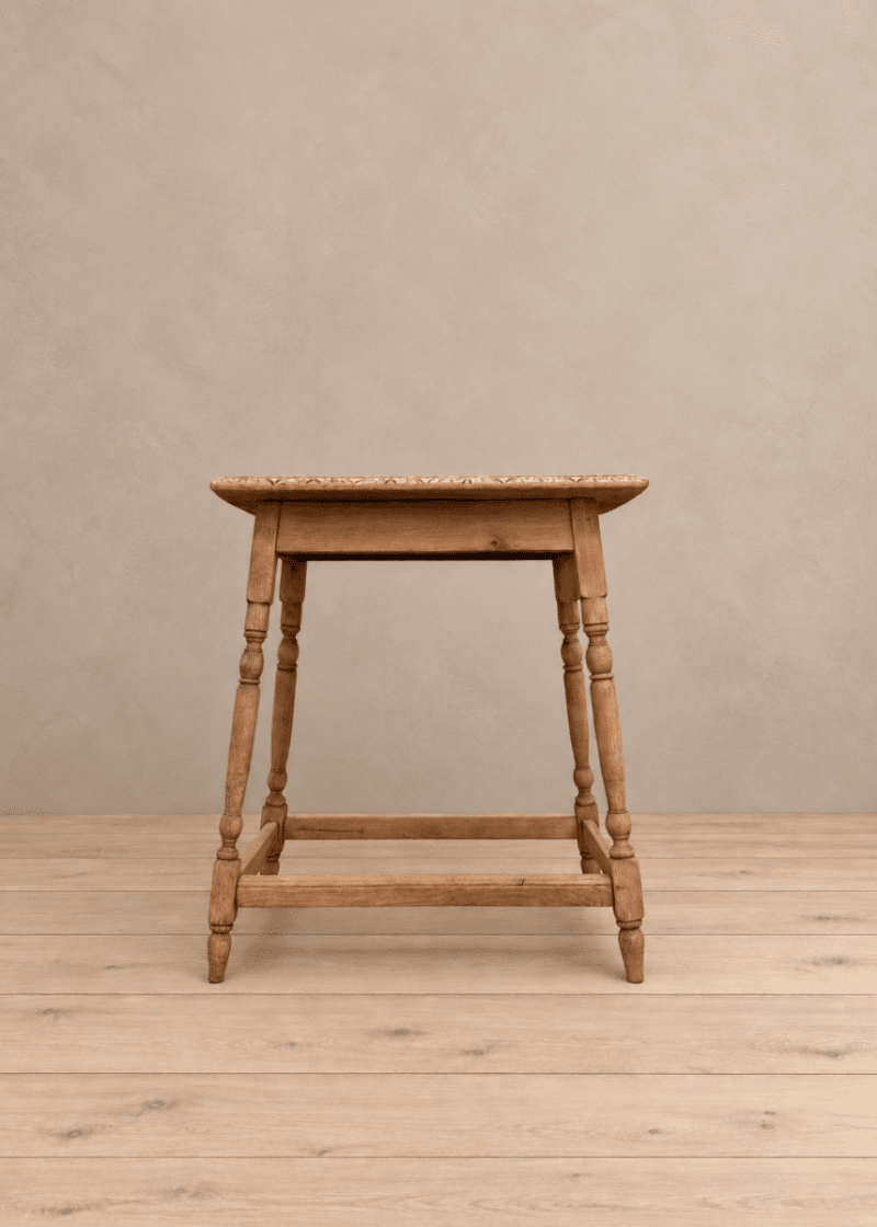 Decorative carved oak side table