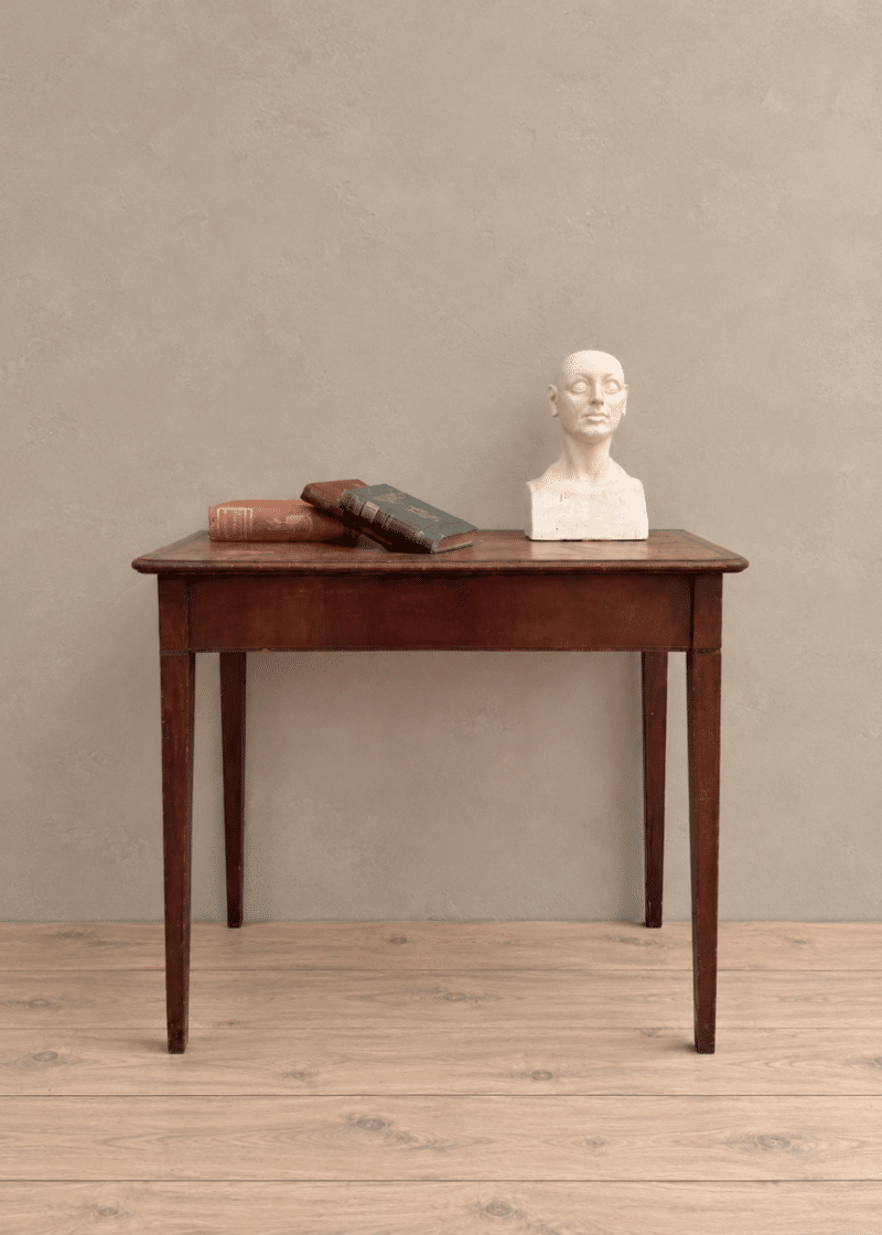 Mahogany leather topped table