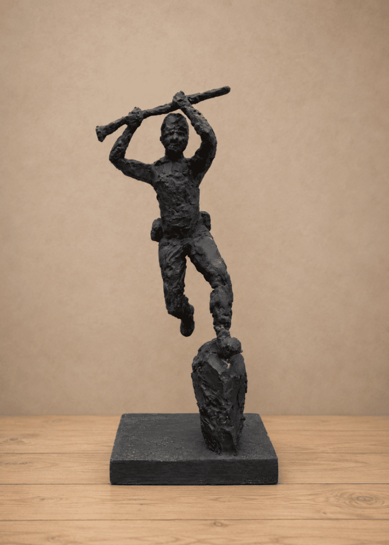 Running soldier plaster figure